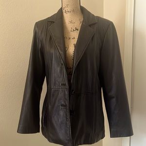 Wilson’s black leather jacket